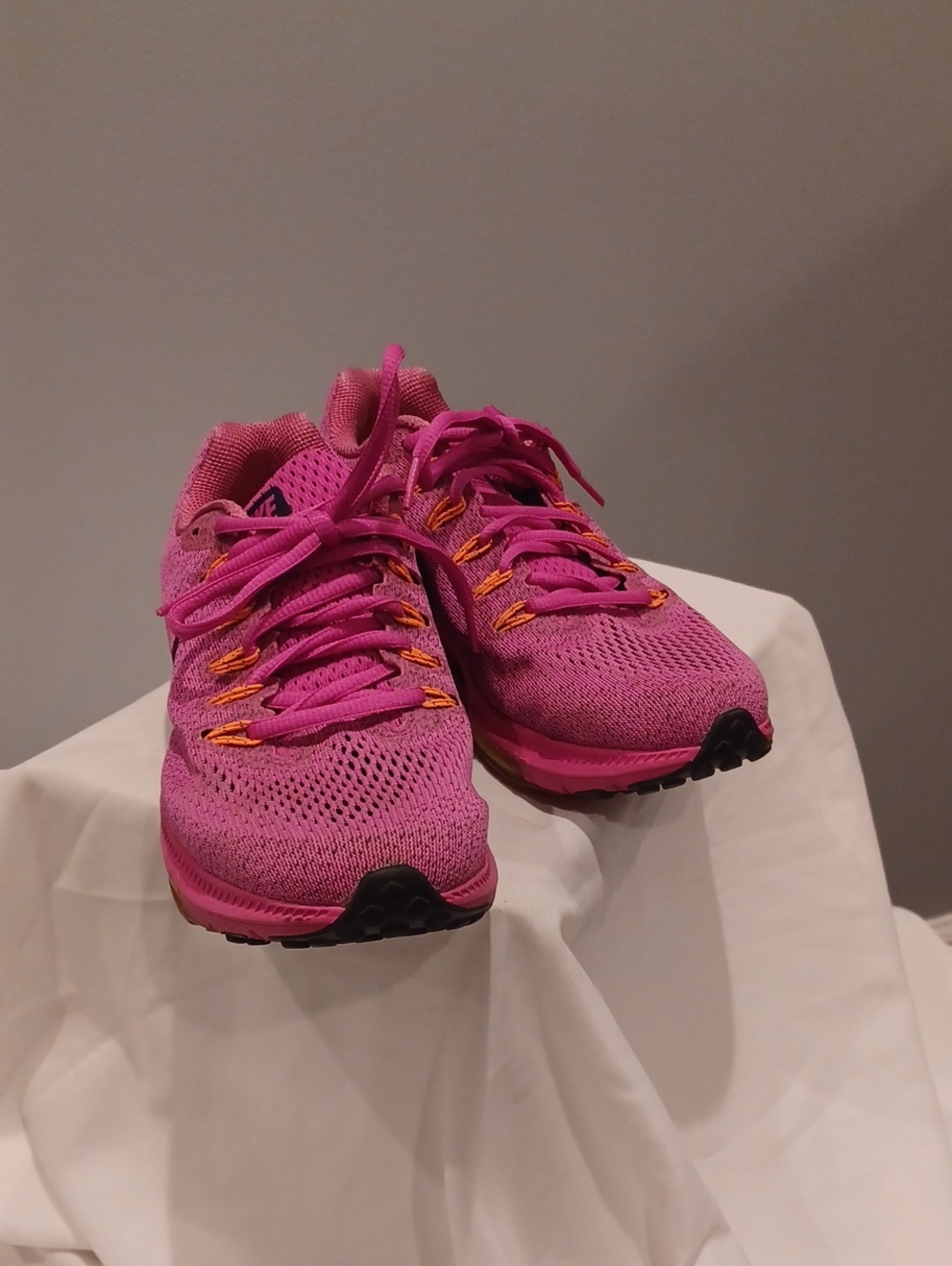Nike Women's Pink Athletic Running Shoes with Orange Accents